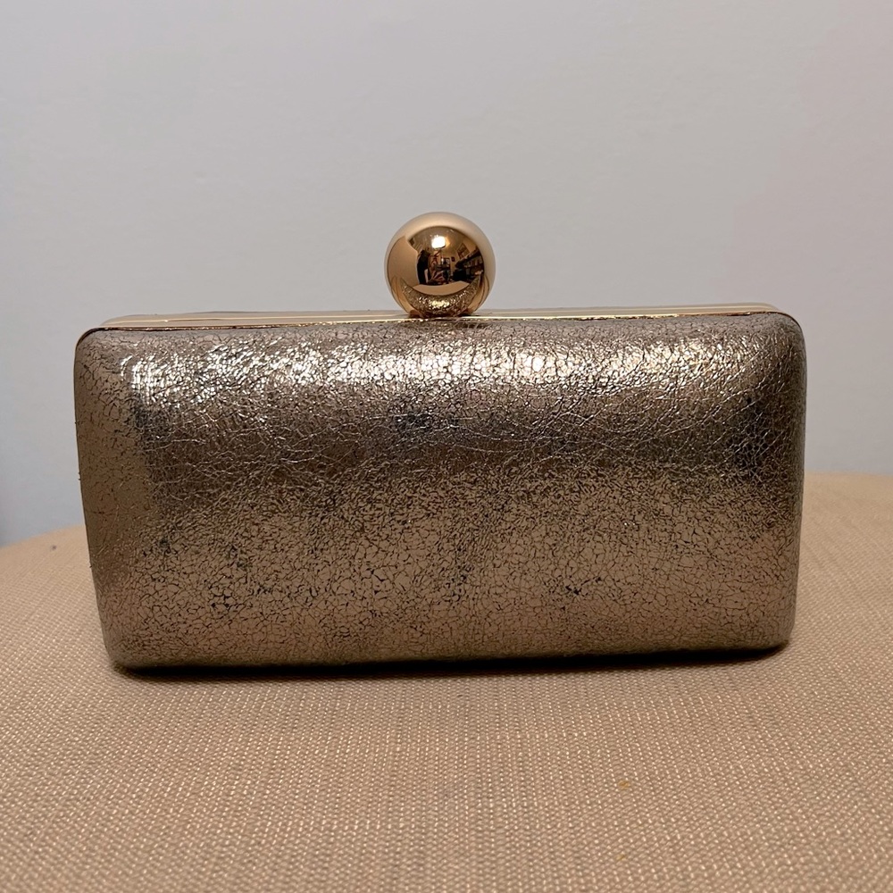 Milly silver and gold clutch